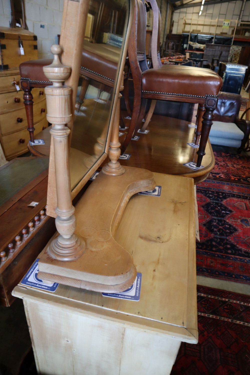 A late Victorian pine four drawer chest, width 83cm, depth 45cm, height 77cm together with a pine toilet mirror